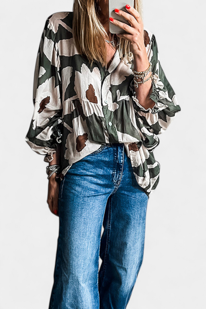 Filomena Blusa con Media Botonadura y Manga Abullonada en Estampado Floral Abstracto