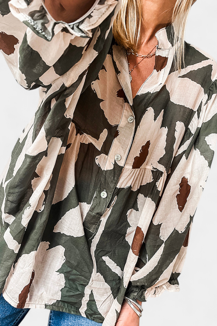 Filomena Blusa con Media Botonadura y Manga Abullonada en Estampado Floral Abstracto