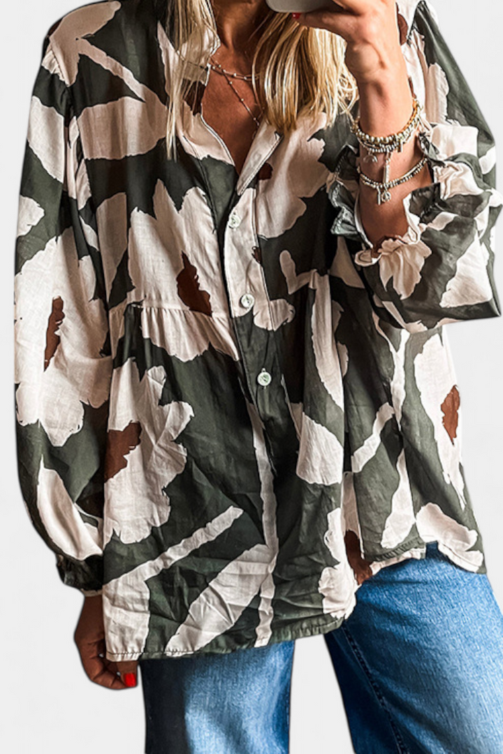 Filomena Blusa con Media Botonadura y Manga Abullonada en Estampado Floral Abstracto